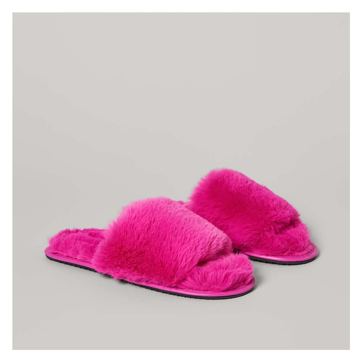 Faux Fur Slippers in Pink from Joe Fresh