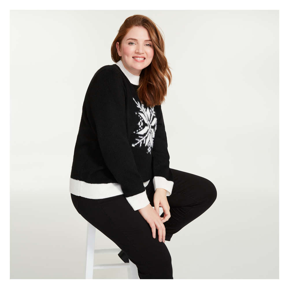 black snowflake sweater